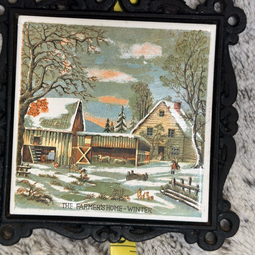 Made in Japan, cast iron trivet with tile. The Farmer’s Home-Winter.